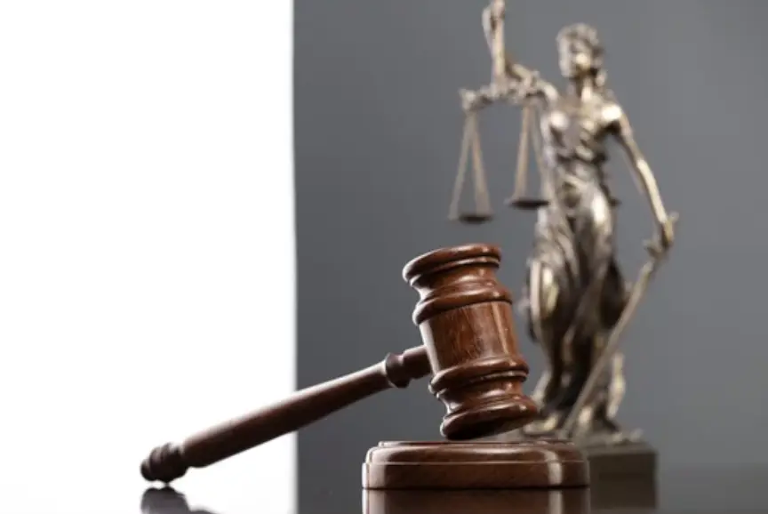 Injured client reviewing compensation with an attorney